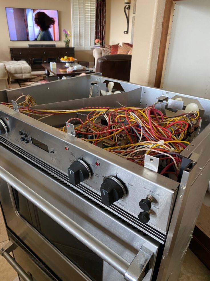 Electrical cooker opened for repair